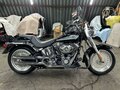 2010 Harley-Davidson Fat Boy, чёрный, 990000 рублей - вид 2