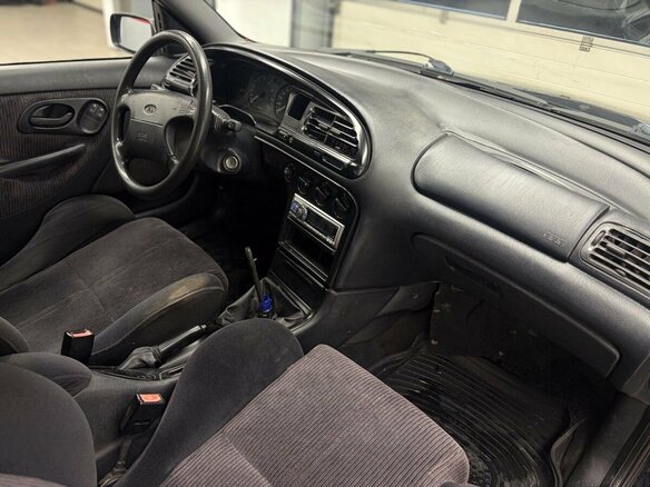 1995 Ford Mondeo I, зелёный - вид 13