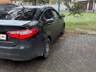 2014 Kia Rio III, чёрный, 680000 рублей, вид 4
