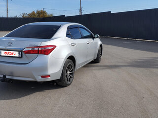 2014 Toyota Corolla XI (E160, E170, E180), серебристый, 1245000 рублей, вид 3