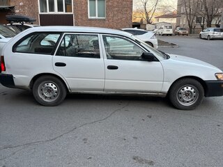 1999 Toyota Corolla VII (E100), белый, 330000 рублей, вид 4