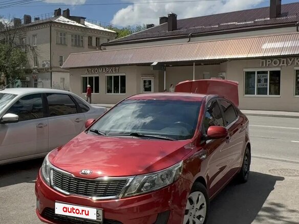 2014 Kia Rio III, красный, 950000 рублей - вид 1