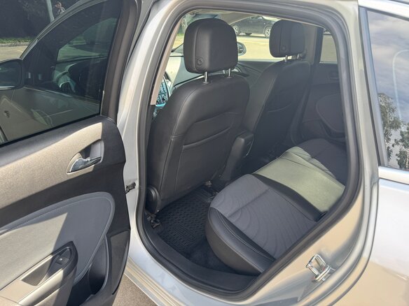 2013 Opel Astra J Рестайлинг, серебристый - вид 11