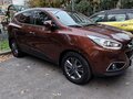 2013 Hyundai ix35 I Рестайлинг, коричневый - вид 5