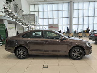 2016 Volkswagen Jetta VI Рестайлинг, коричневый, 1350000 рублей, вид 4