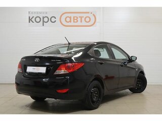2012 Hyundai Solaris I, чёрный, 679000 рублей, вид 3