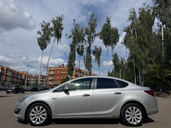 2013 Opel Astra J Рестайлинг, серебристый - вид 7