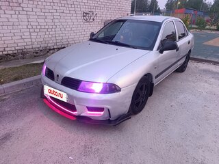 2003 Mitsubishi Carisma I Рестайлинг, серебристый, 400000 рублей, вид 1
