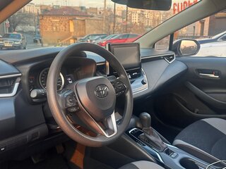 2022 Toyota Corolla XII (E210), белый, 1850000 рублей, вид 2