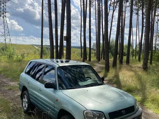 1996 Toyota RAV4 I (XA10), голубой, 425000 рублей, вид 3