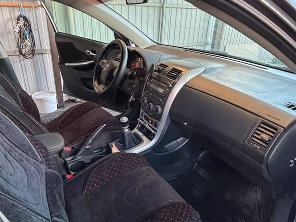 2011 Toyota Corolla X (E140, E150) Рестайлинг, чёрный, 1300000 рублей - вид 7