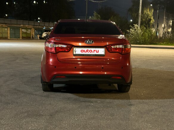 2012 Kia Rio 4-speed III, красный, 750000 рублей - вид 5