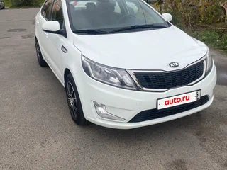 2014 Kia Rio 4-speed III, белый, 900000 рублей, вид 1