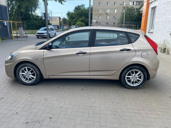 2012 Hyundai Solaris I, бежевый - вид 3