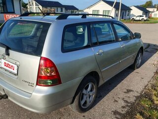 2007 Toyota Corolla IX (E120, E130) Рестайлинг, серебристый, 520000 рублей, вид 2