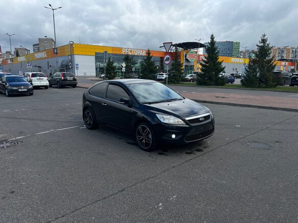 2010 Ford Focus II Рестайлинг, чёрный - вид 2
