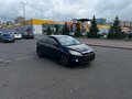2010 Ford Focus II Рестайлинг, чёрный - вид 2