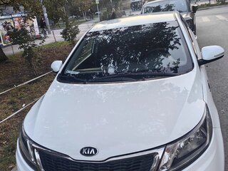 2014 Kia Rio 6-speed III, белый, 910000 рублей, вид 1