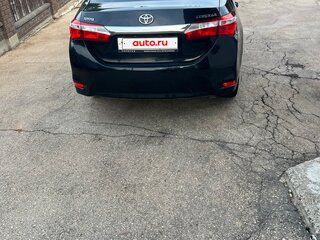 2014 Toyota Corolla XI (E160, E170, E180), чёрный, 1250000 рублей, вид 4