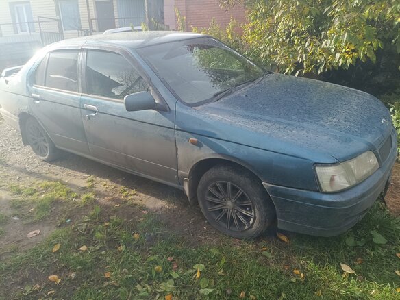 1997 Nissan Bluebird SR18 XI (U14), синий - вид 6