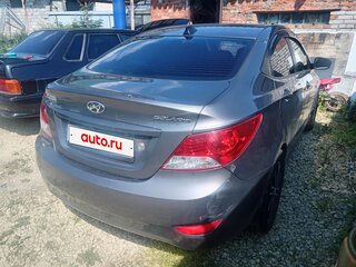 2011 Hyundai Solaris I, чёрный, 650000 рублей, вид 4
