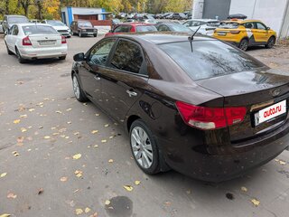 2011 Kia Cerato 6-speed II, пурпурный, 700000 рублей, вид 5
