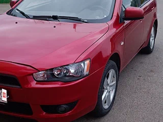 2008 Mitsubishi Lancer X, красный, 400000 рублей, вид 1