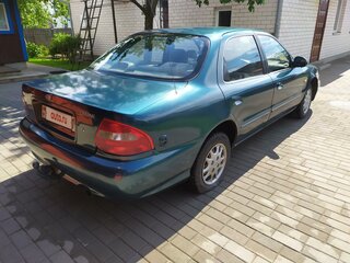 1999 Kia Clarus II, зелёный, 104437 рублей, вид 4