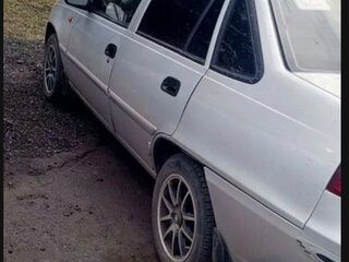 2012 Daewoo Nexia I Рестайлинг, серебристый, 160000 рублей, вид 5