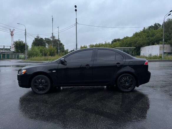 2010 Mitsubishi Lancer X, чёрный, 685000 рублей - вид 6