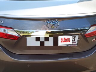 2013 Toyota Corolla XI (E160, E170, E180), коричневый, 1350000 рублей, вид 3
