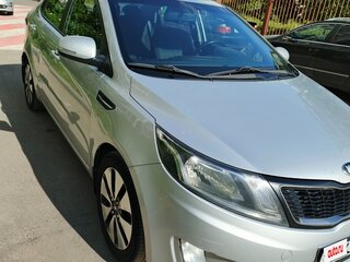 2013 Kia Rio 4-speed III, серый, 850000 рублей, вид 1