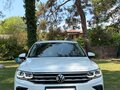 2021 Volkswagen Tiguan II Рестайлинг, белый - вид 1