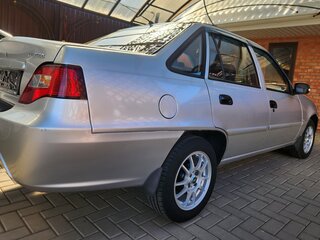 2014 Daewoo Nexia I Рестайлинг, серебристый, 490000 рублей, вид 4