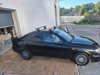2002 Nissan Almera II (N16), чёрный, 180000 рублей, вид 2
