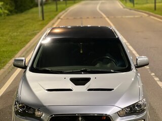 2010 Mitsubishi Lancer X, серебристый, 875000 рублей, вид 2