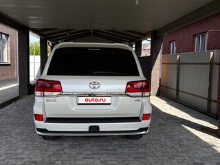 2021 Toyota Land Cruiser 200 Series Рестайлинг 2, белый, 7950000 рублей, вид 4