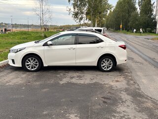 2013 Toyota Corolla XI (E160, E170, E180), белый, 950000 рублей, вид 4