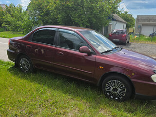 2006 Kia Spectra I Рестайлинг 2, пурпурный, 310000 рублей, вид 3