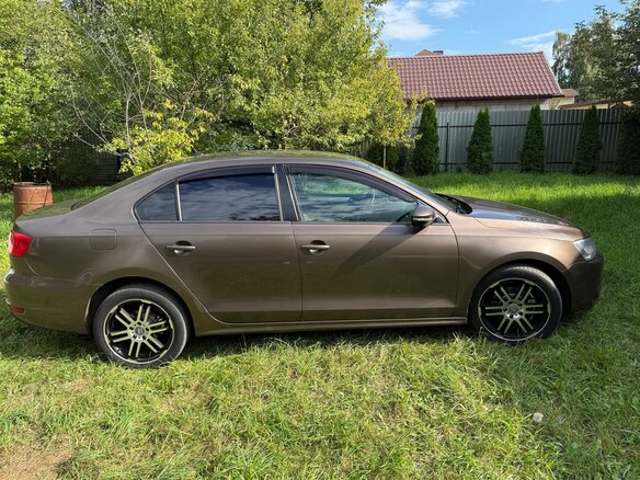 2012 Volkswagen Jetta VI, коричневый, 920000 рублей - вид 1