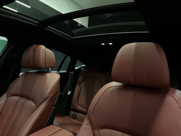 2020 BMW X6 40i III (G06), коричневый, 8190000 рублей - вид 9