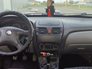 2001 Nissan Almera II (N16), серебристый, 320000 рублей, вид 4