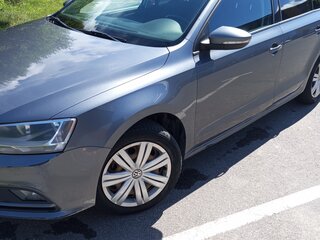 2015 Volkswagen Jetta VI Рестайлинг, серый, 880000 рублей, вид 2