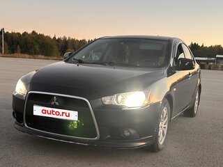 2011 Mitsubishi Lancer X Рестайлинг, чёрный, 650000 рублей, вид 2