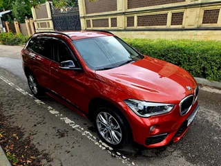 2017 BMW X1 18d xDrive II (F48), оранжевый, 2650000 рублей, вид 5
