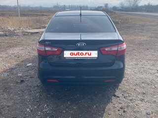 2013 Kia Rio 4-speed III, чёрный, 730000 рублей, вид 3