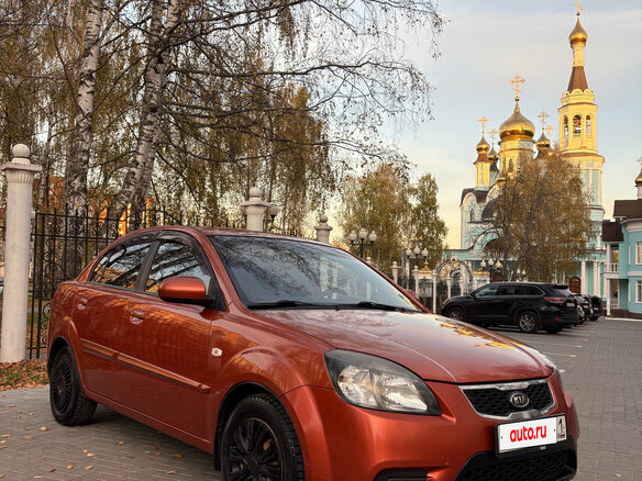 2010 Kia Rio II Рестайлинг, оранжевый, 495000 рублей - вид 2