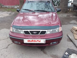 2006 Daewoo Nexia I, пурпурный, 200000 рублей, вид 1