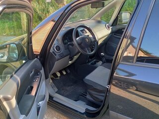 2010 Suzuki SX4 I (Classic) Рестайлинг, чёрный, 890000 рублей, вид 3