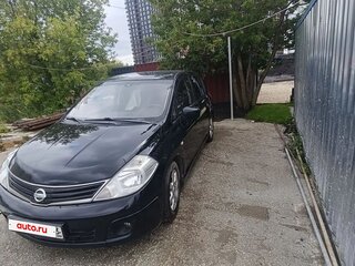 2010 Nissan Tiida I Рестайлинг, чёрный, 590000 рублей, вид 1